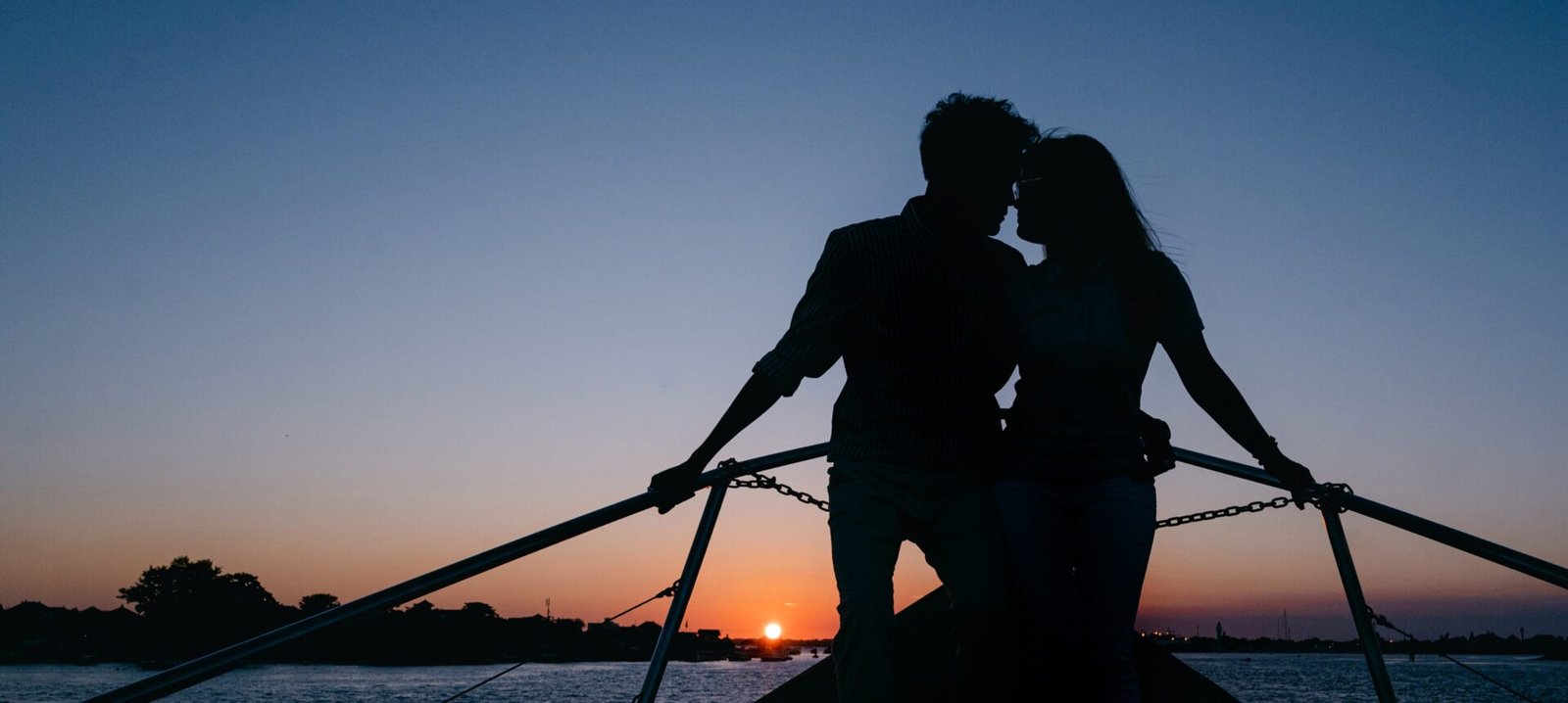 A couple sharing sunset aboard Shivanna in Bali